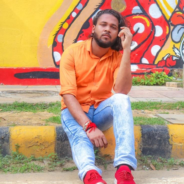 Alex Rivera, Lead Design Curator at Calm Kernel Current, reviewing corporate floral arrangements